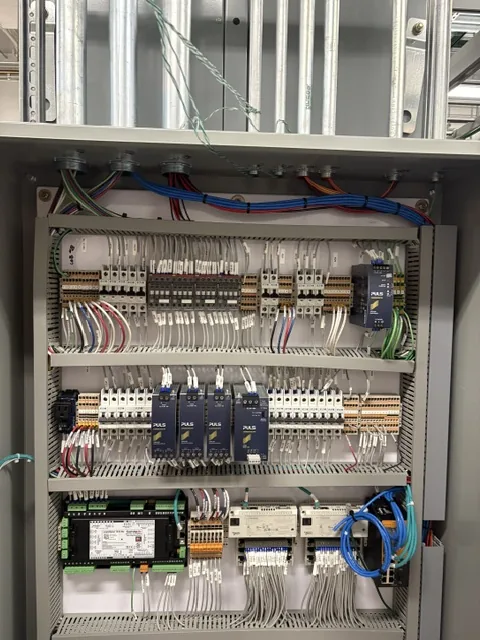 Open power distribution and control cabinet at an Arizona critical power facility